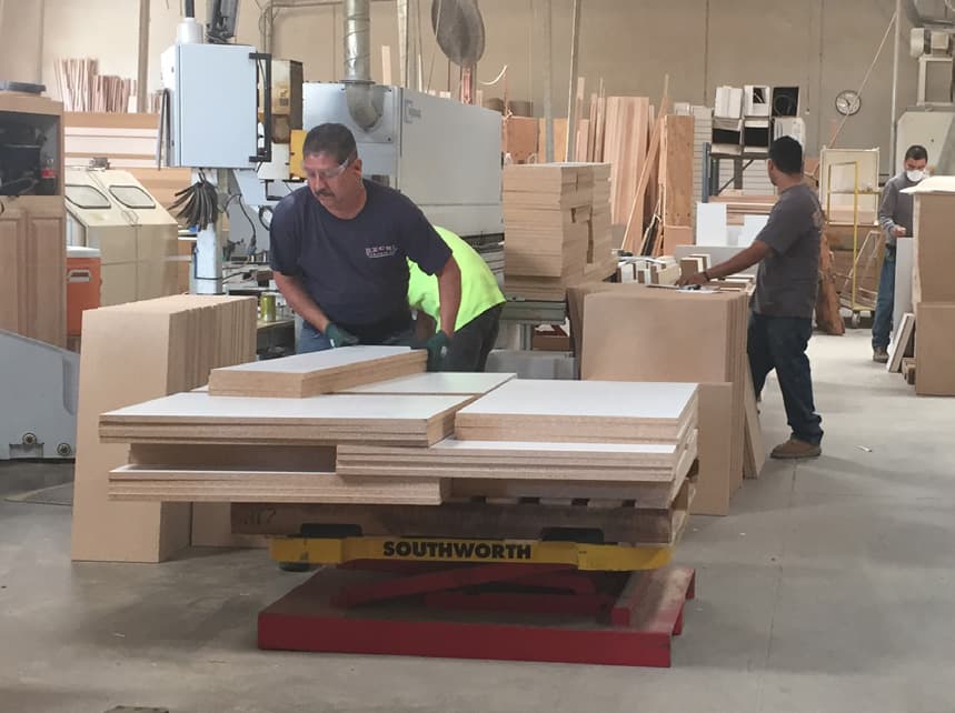 Scissors Lift Tables Solve an Ergonomic Problem for an Office Manufacturing Company