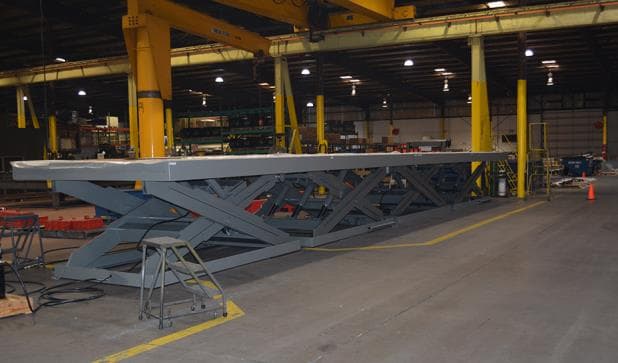 Giant Platform Lift Integrates with Conveyor System for HVAC Manufacturer