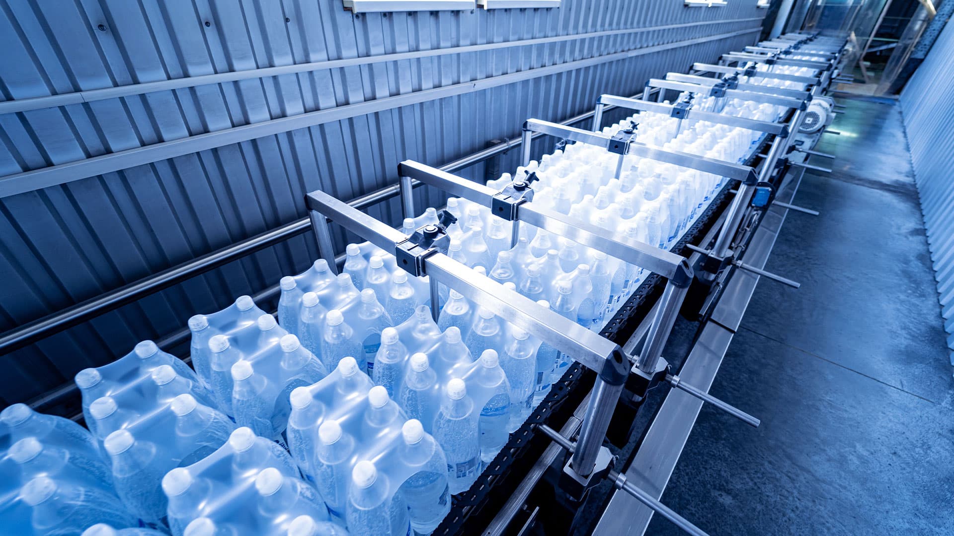 modern-strapping-transporting-machine-packaging-line-beverage-plant_Avoid Bottlenecks- SLAM Warehouse Automation