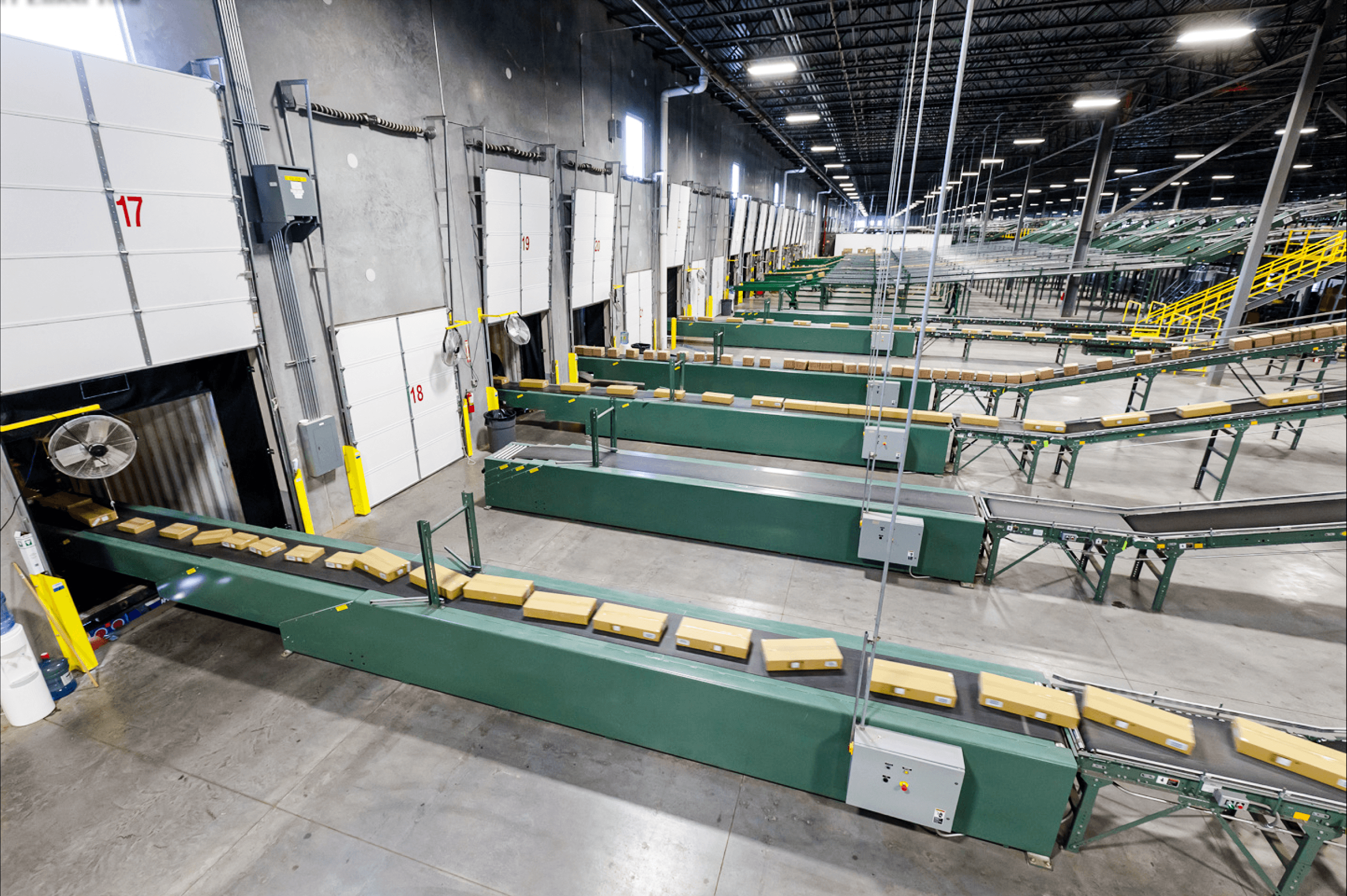 Using Conveyors for Loading and Unloading Trucks & Containers