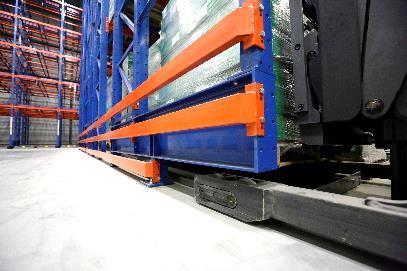 Raised, Cantilevered I-Beam Base with Narrow Bay Openings Maximizes Pallet Positions